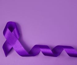 a purple background with a purple ribbon